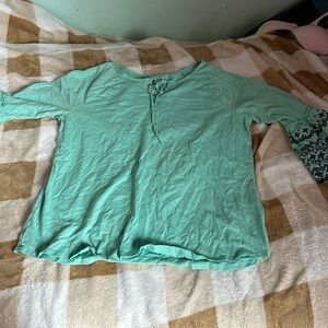 women teal top